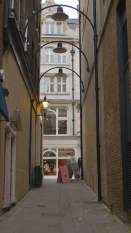 Vertical-Video-Of-Shops-In-Lancaster-Court-In-Mayfair-London-UK